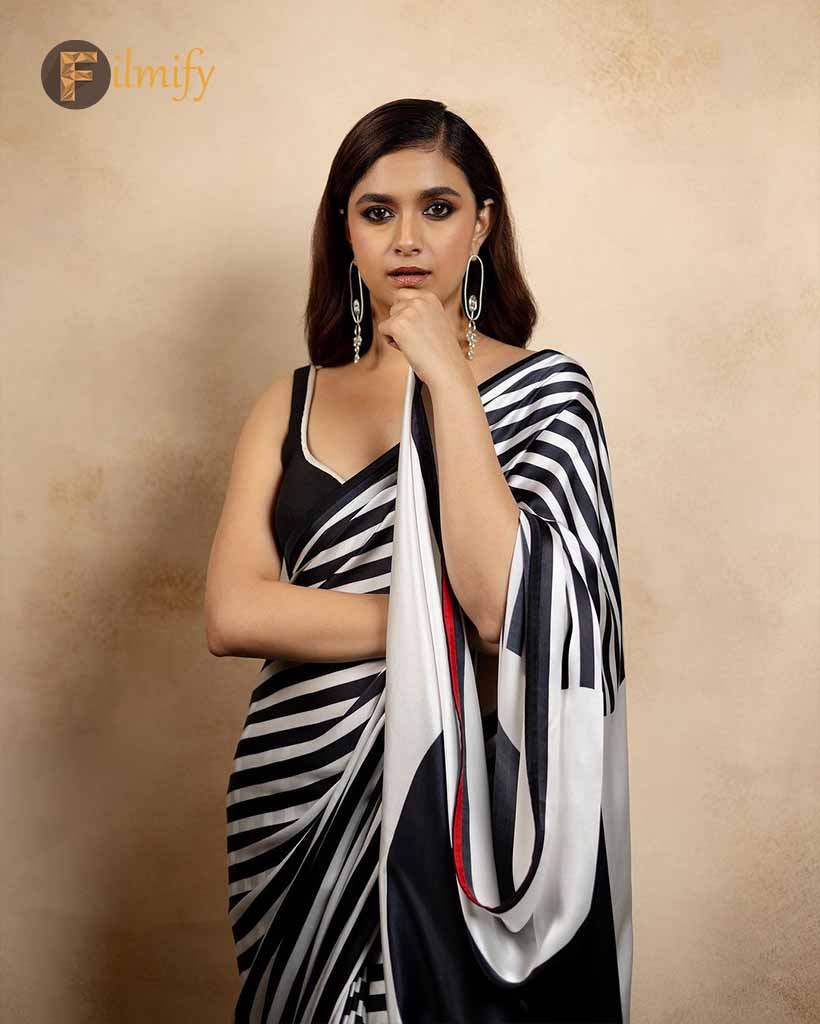 Keerthy Suresh posed elegantly in a black and white saree.