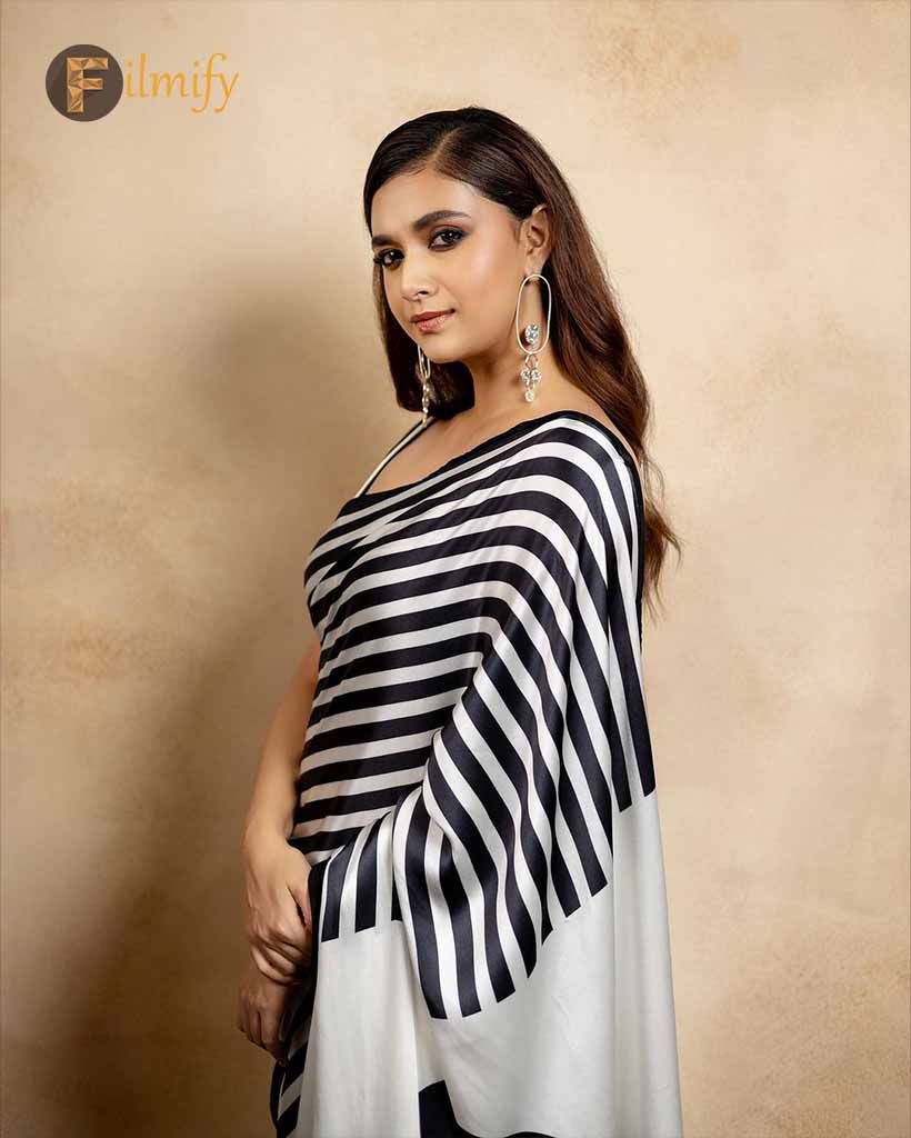 Keerthy Suresh posed elegantly in a black and white saree.